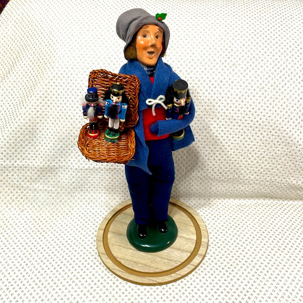 Byers Choice Ltd.  2005 collection.  Christmas Doll with nutcrackers.